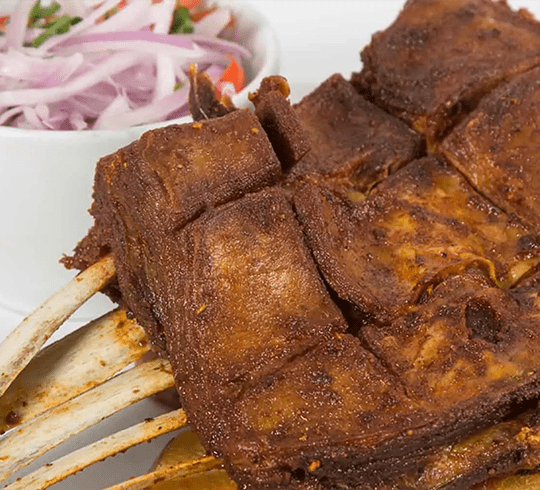 menu-el-pallar-Costillar-de-cordero-(arroz,-papa-dorada-y-salsa-criolla)-min